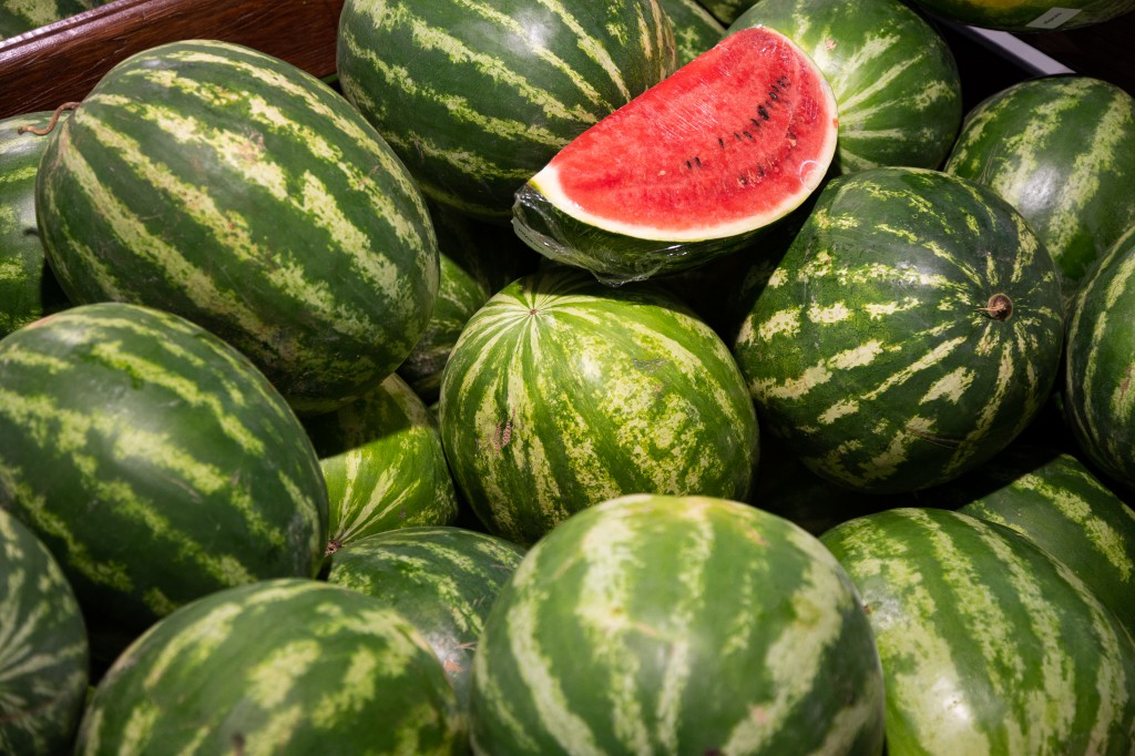Close-up of mellow water-melons in box in supermarket